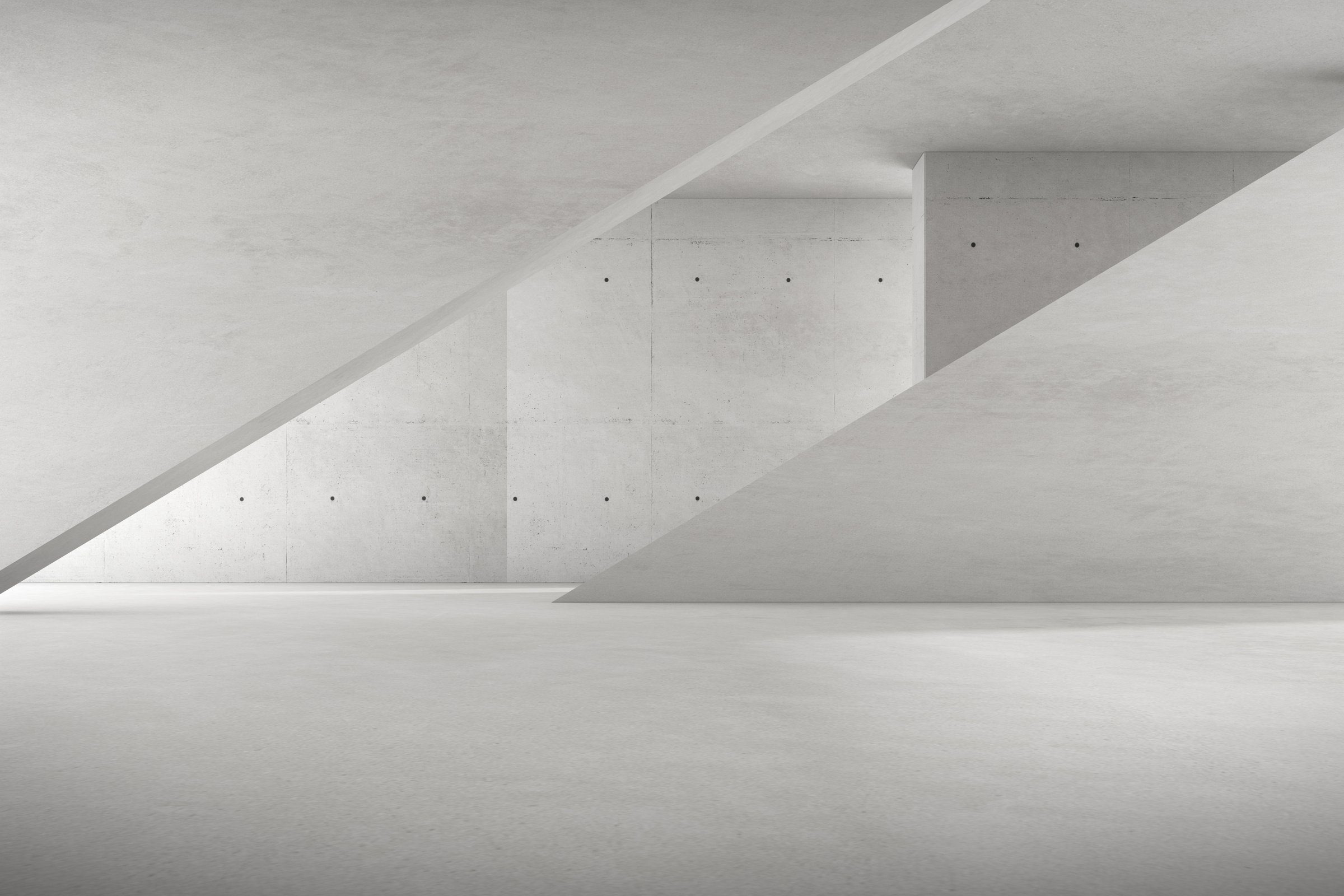 White Concrete Structure with Light and Shadow on Wall